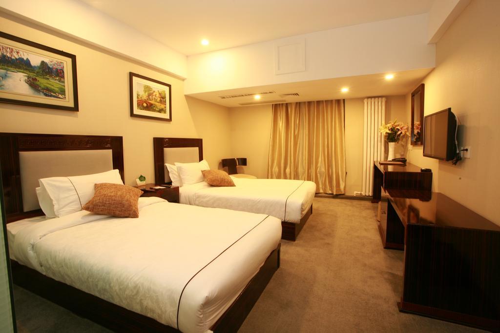 Harbin Yakelai Holiday Hotel Rum bild