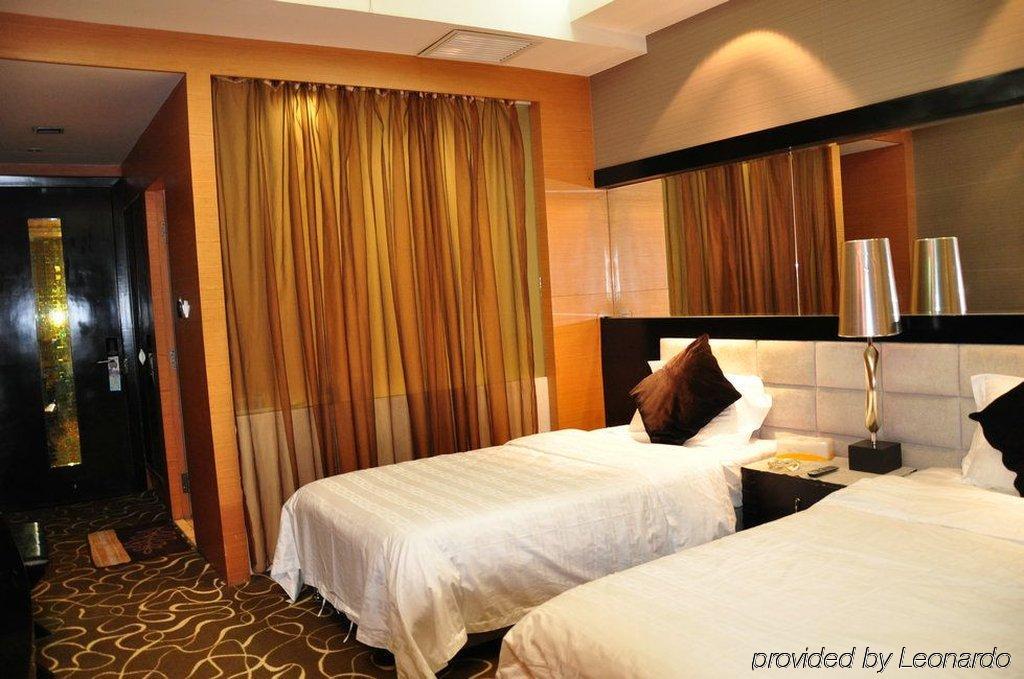 Harbin Yakelai Holiday Hotel Rum bild