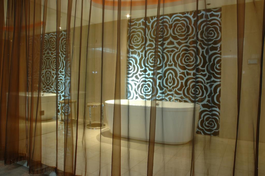 Harbin Yakelai Holiday Hotel Rum bild