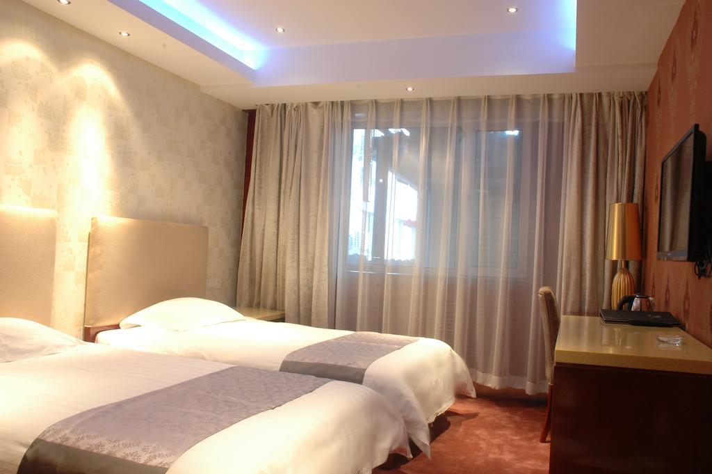 Harbin Yakelai Holiday Hotel Rum bild