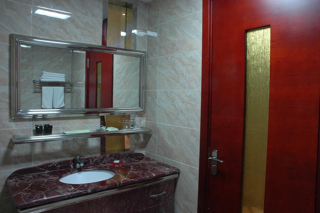 Harbin Yakelai Holiday Hotel Rum bild