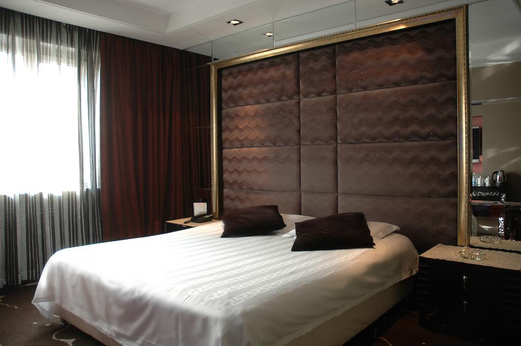 Harbin Yakelai Holiday Hotel Rum bild