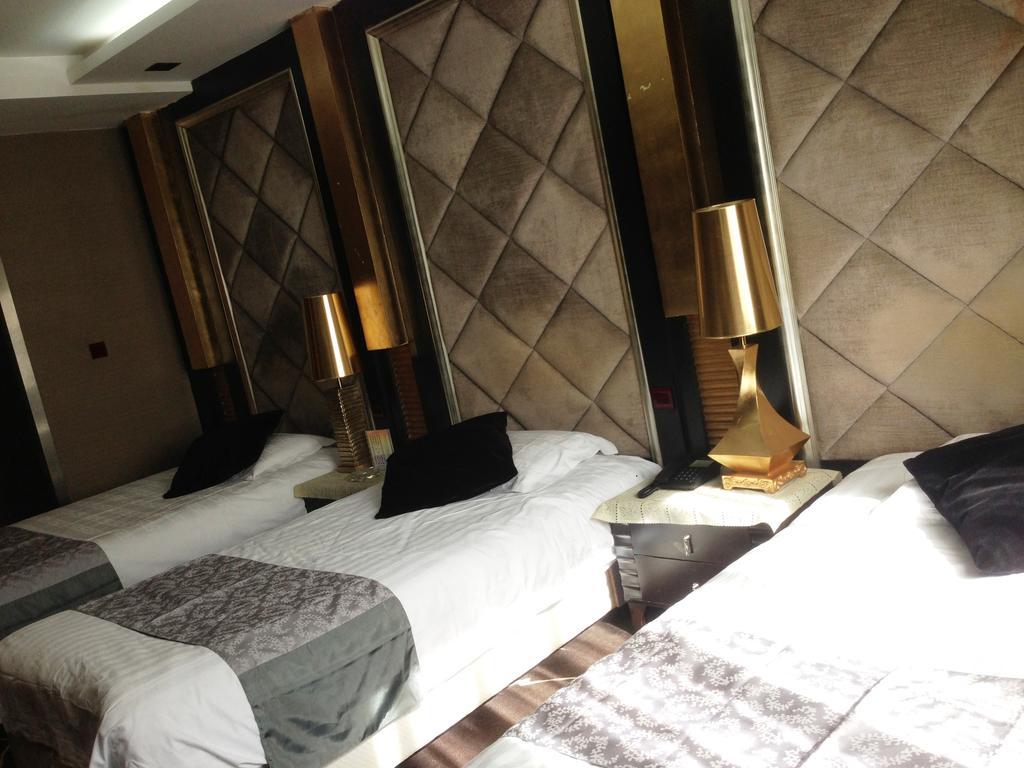 Harbin Yakelai Holiday Hotel Rum bild
