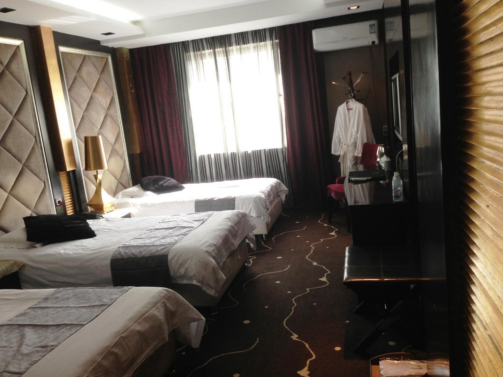 Harbin Yakelai Holiday Hotel Rum bild
