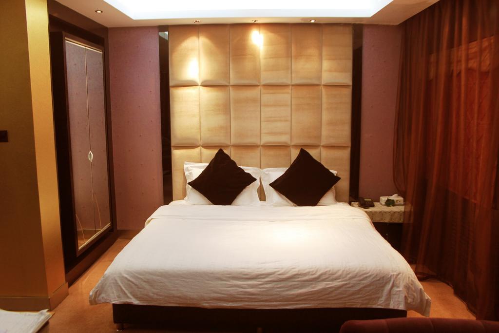 Harbin Yakelai Holiday Hotel Rum bild