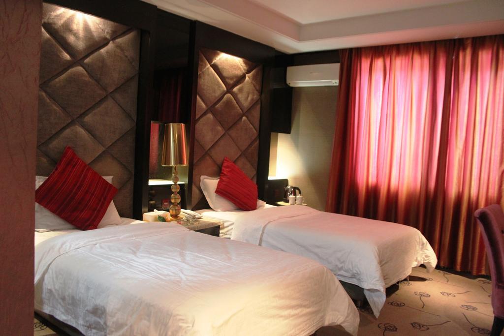 Harbin Yakelai Holiday Hotel Rum bild
