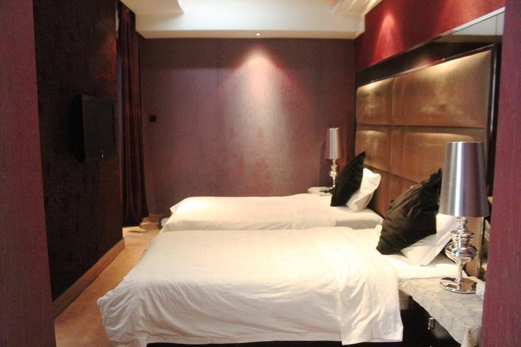 Harbin Yakelai Holiday Hotel Rum bild