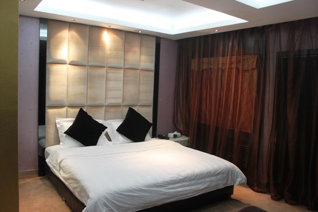 Harbin Yakelai Holiday Hotel Rum bild