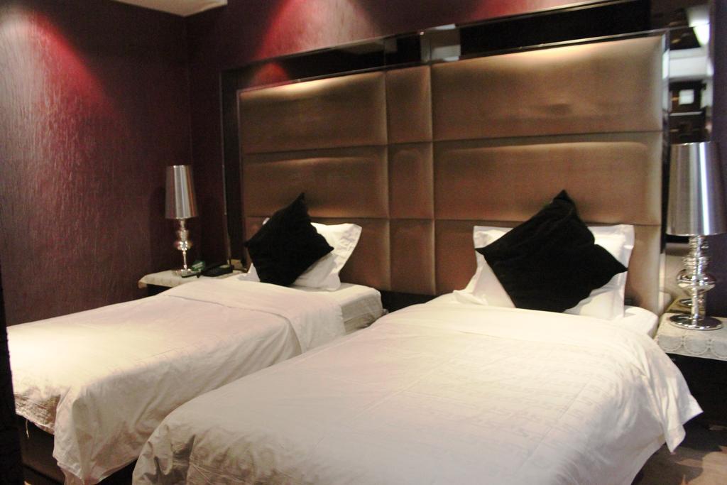 Harbin Yakelai Holiday Hotel Rum bild